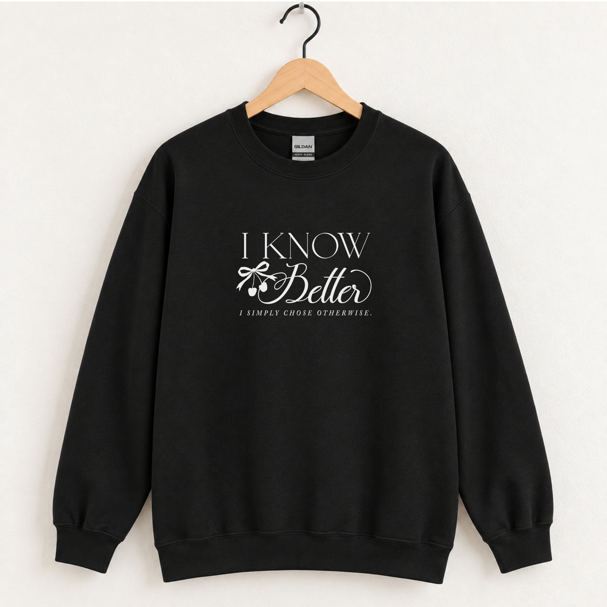 I Know Better, I Simply Chose Otherwise crewneck sweatshirt in Black on a wooden hanger