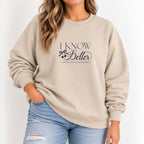 Woman wearing the I Know Better, I Simply Chose Otherwise crewneck in Sand with a navy chest print