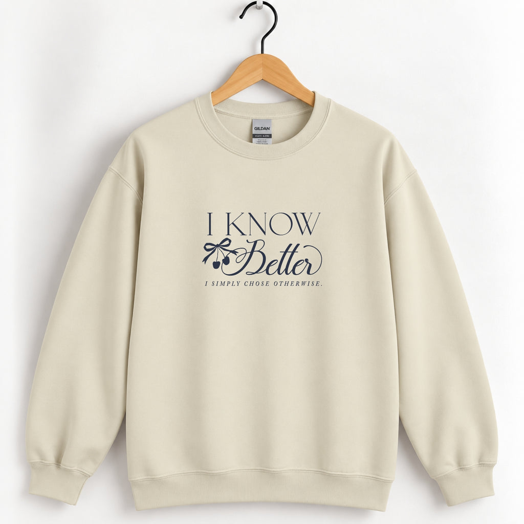 I Know Better, I Simply Chose Otherwise crewneck sweatshirt in Sand on a wooden hanger, navy chest print
