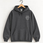 Raised Better Than This crest hoodie in Dark Heather on a wooden hanger