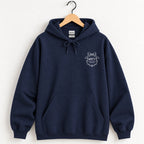 Raised Better Than This crest hoodie in Navy on a wooden hanger, white left-chest crest
