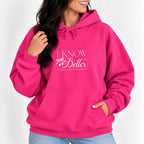 Woman wearing the I Know Better, I Simply Chose Otherwise hoodie in Heliconia pink