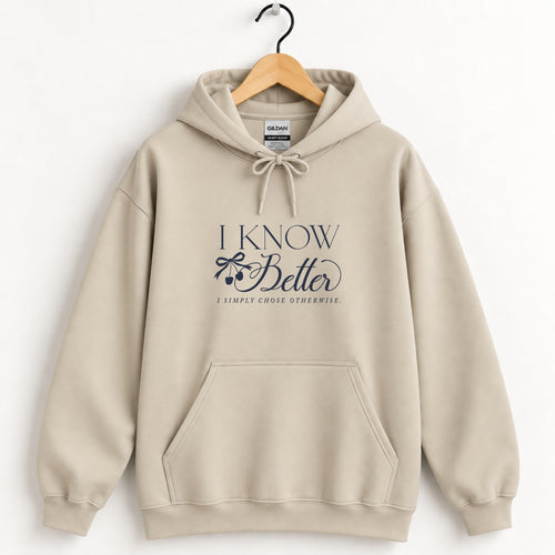 I Know Better, I Simply Chose Otherwise hoodie in Sand on a wooden hanger, navy chest print