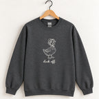 Duck Off crewneck sweatshirt in Dark Heather on a wooden hanger, white duck design center chest