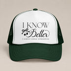 I Know Better, I Simply Chose Otherwise foam trucker hat in Dark Green, front view, black script and cherry bow on a white panel