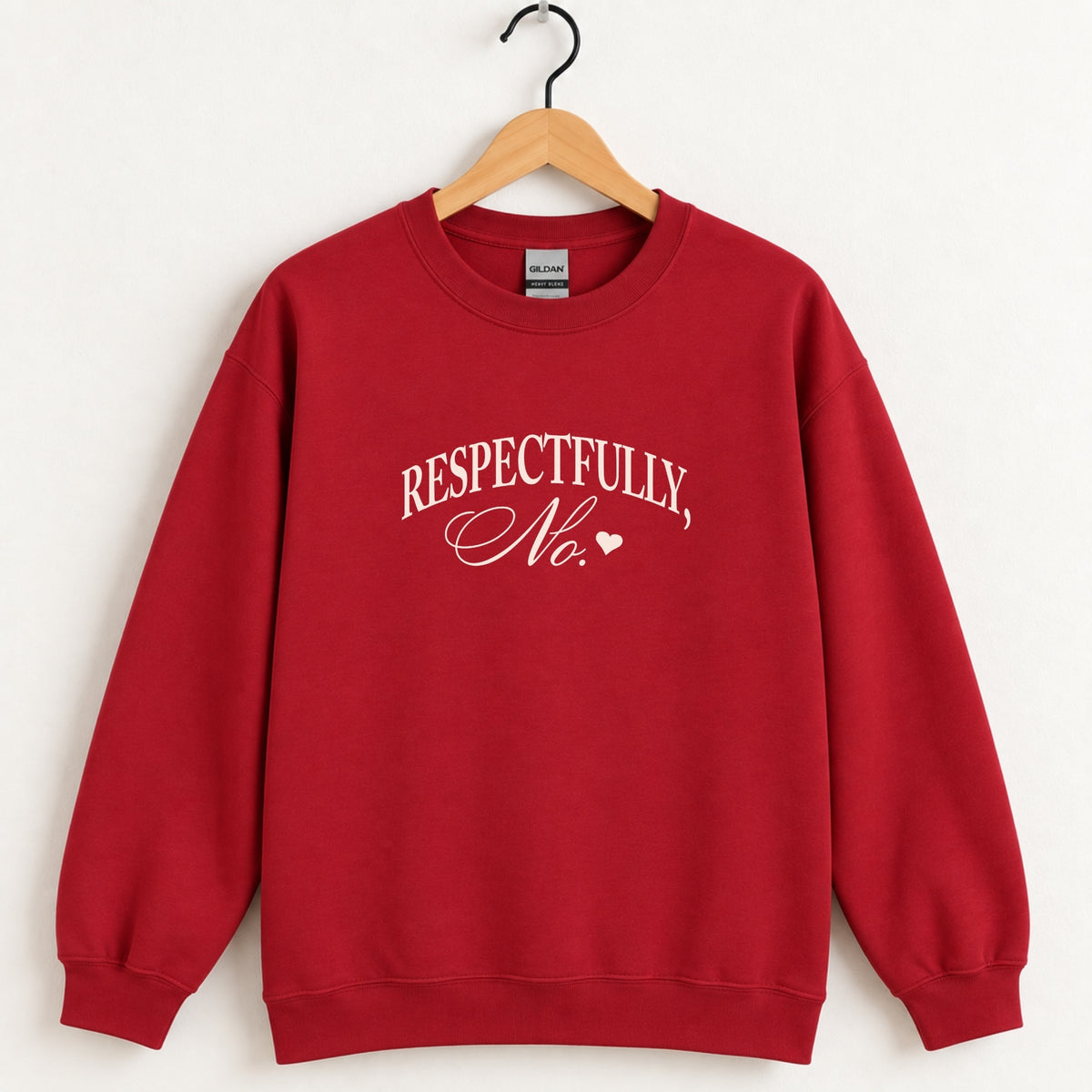 Respectfully, No crewneck sweatshirt in Cardinal Red on a wooden hanger