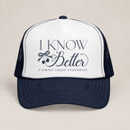 I Know Better, I Simply Chose Otherwise foam trucker hat in Navy, front view, navy script and cherry bow on a white panel