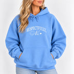 Woman wearing the Respectfully, No hoodie in Carolina Blue with jeans