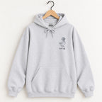 Duck Off hoodie in Ash on a wooden hanger, small navy duck in a bonnet on the left chest