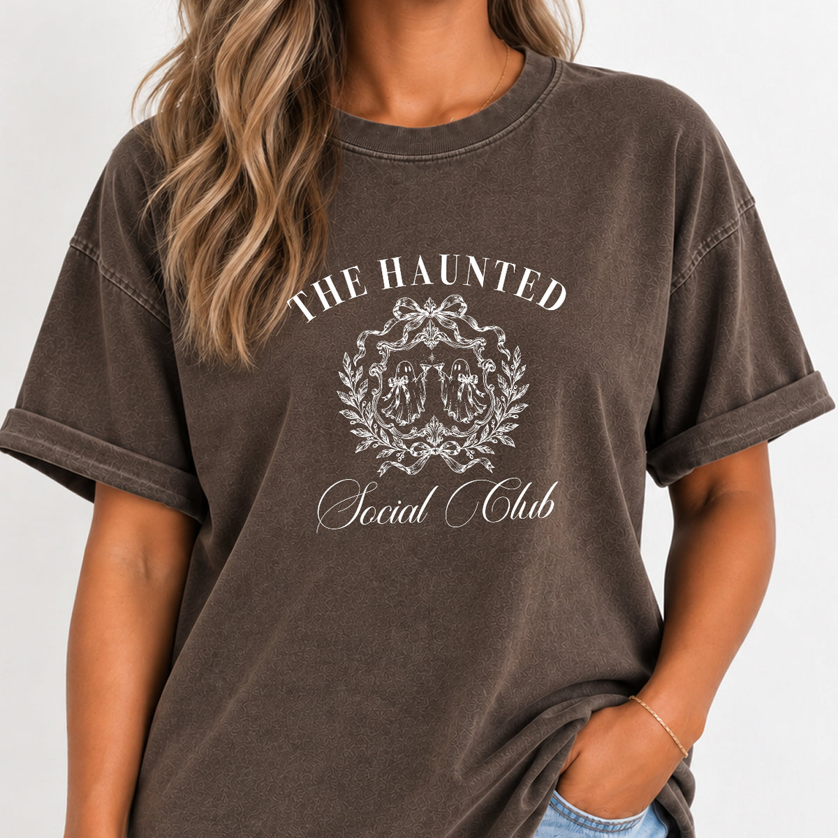 Woman wearing The Haunted Social Club crest tee in Espresso