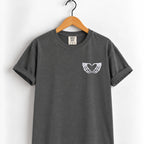 Heart hands skeleton embroidered tee in Pepper on a wooden hanger