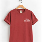 Serial Reader tee in Chili on a wooden hanger