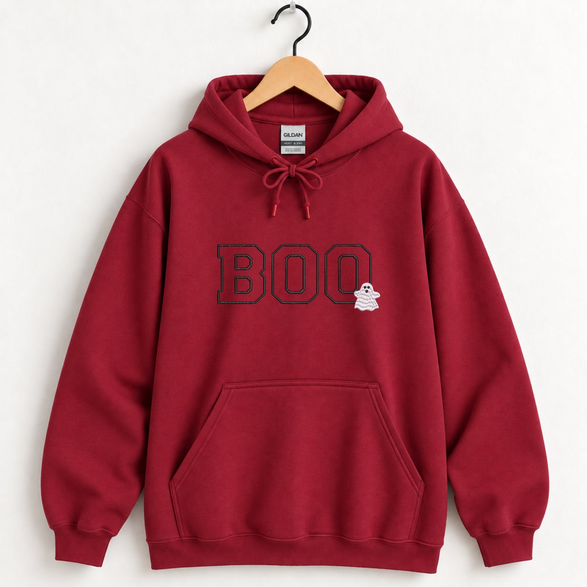 Boo embroidered hoodie in Cardinal Red on a wooden hanger