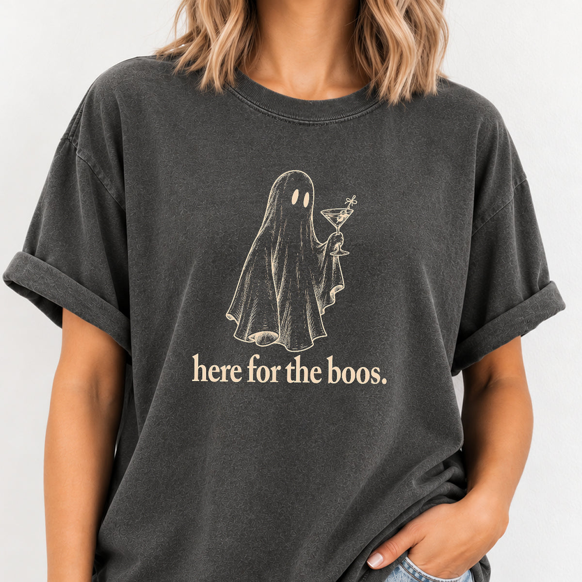 Woman wearing the Here for the Boos ghost martini tee in Pepper with jeans