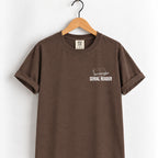 Serial Reader tee in Espresso on a wooden hanger
