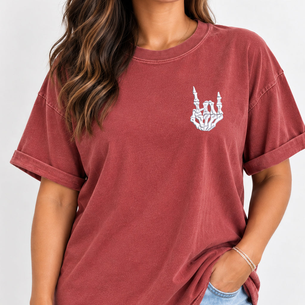 Woman wearing the rock on skeleton hand embroidered tee in Chili