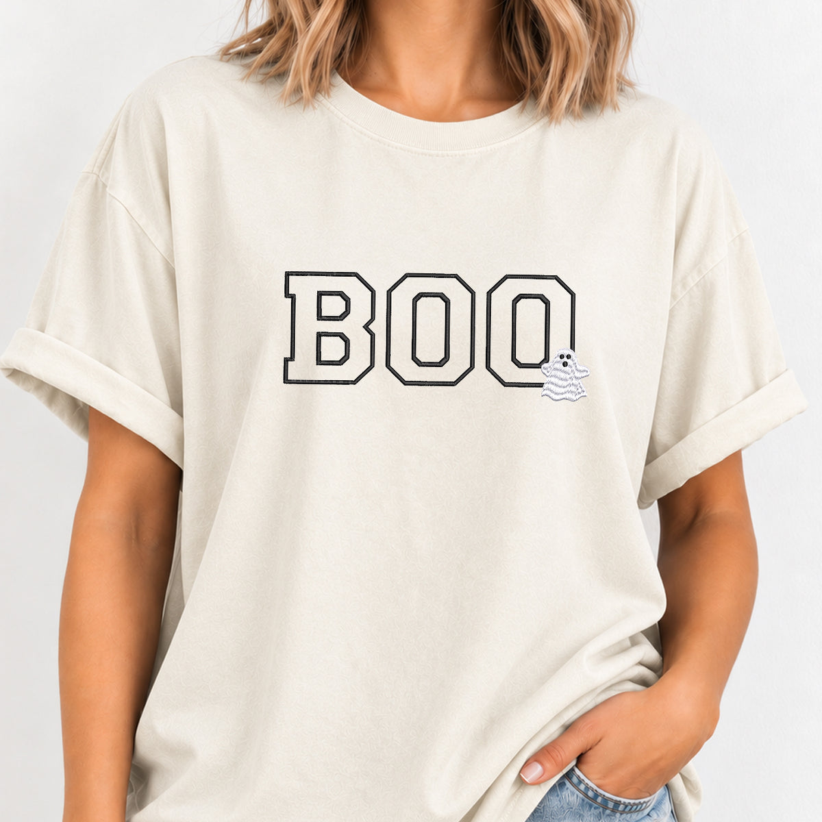 Woman wearing the Boo embroidered tee in Ivory