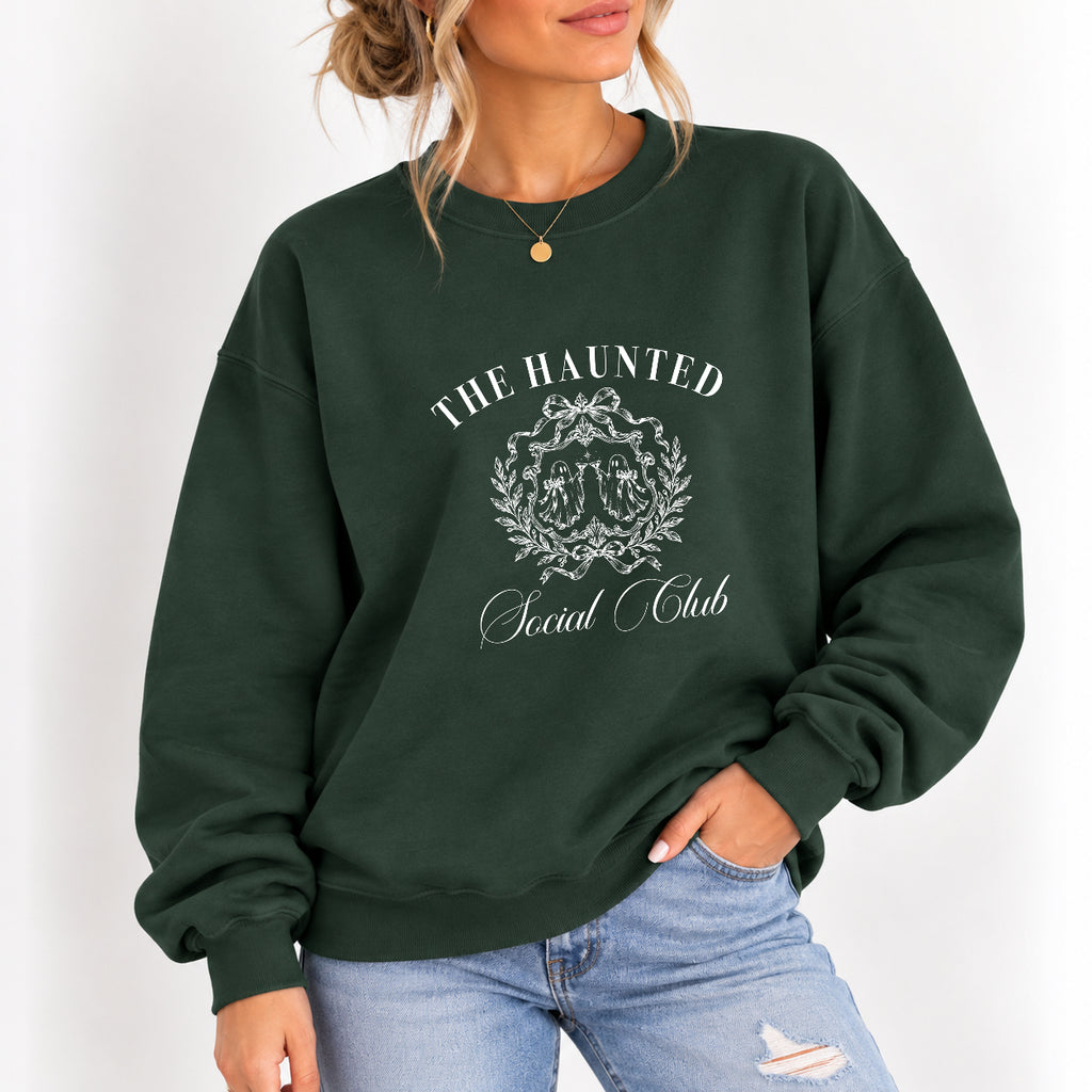 Woman wearing The Haunted Social Club crewneck sweatshirt in Forest Green with jeans