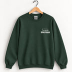 Serial Reader crewneck sweatshirt in Forest Green on a wooden hanger