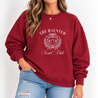 Woman wearing The Haunted Social Club crewneck sweatshirt in Cardinal Red with jeans