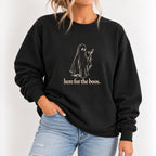 Woman wearing the Here for the Boos crewneck sweatshirt in Black with jeans