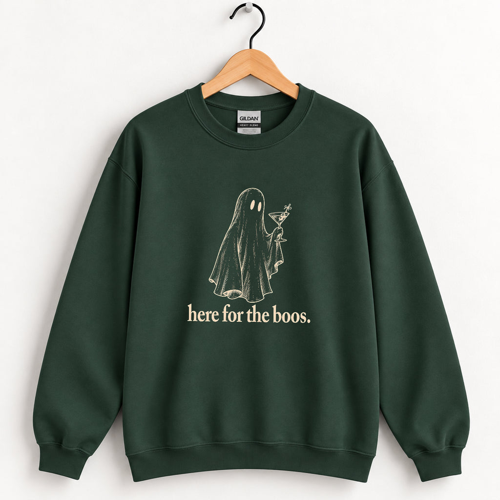 Here for the Boos crewneck sweatshirt in Forest Green on a wooden hanger