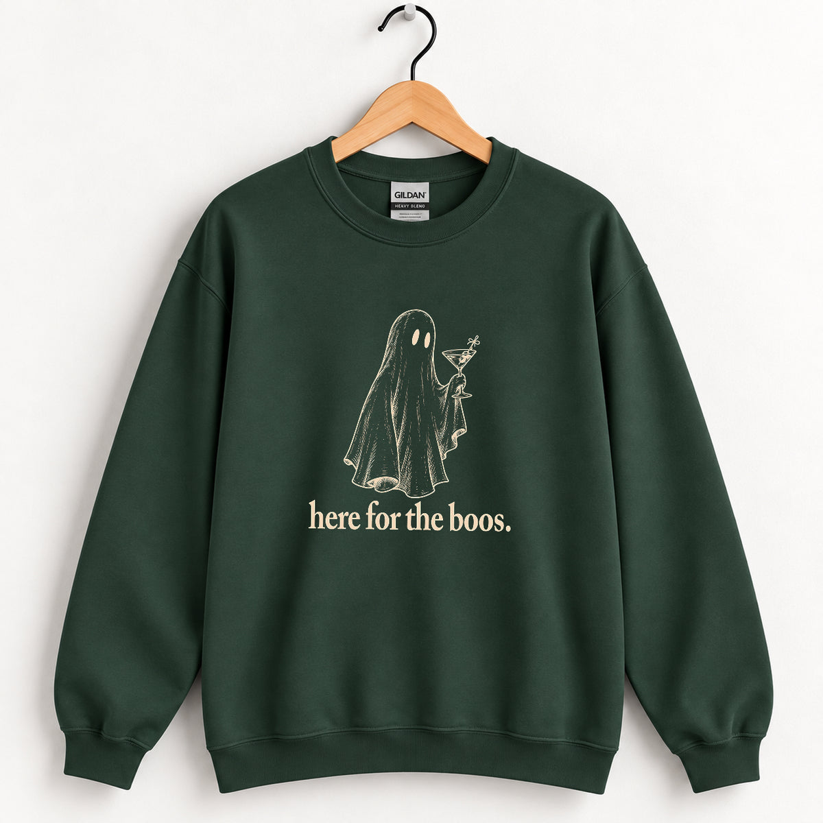 Here for the Boos crewneck sweatshirt in Forest Green on a wooden hanger