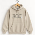 Boo embroidered hoodie in Sand on a wooden hanger, black varsity BOO with a small white ghost