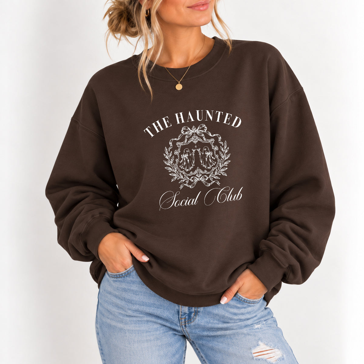 Woman wearing The Haunted Social Club crewneck sweatshirt in Dark Chocolate with jeans