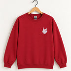 Rock On Skeleton Hand embroidered crewneck sweatshirt in Cardinal Red on a wooden hanger