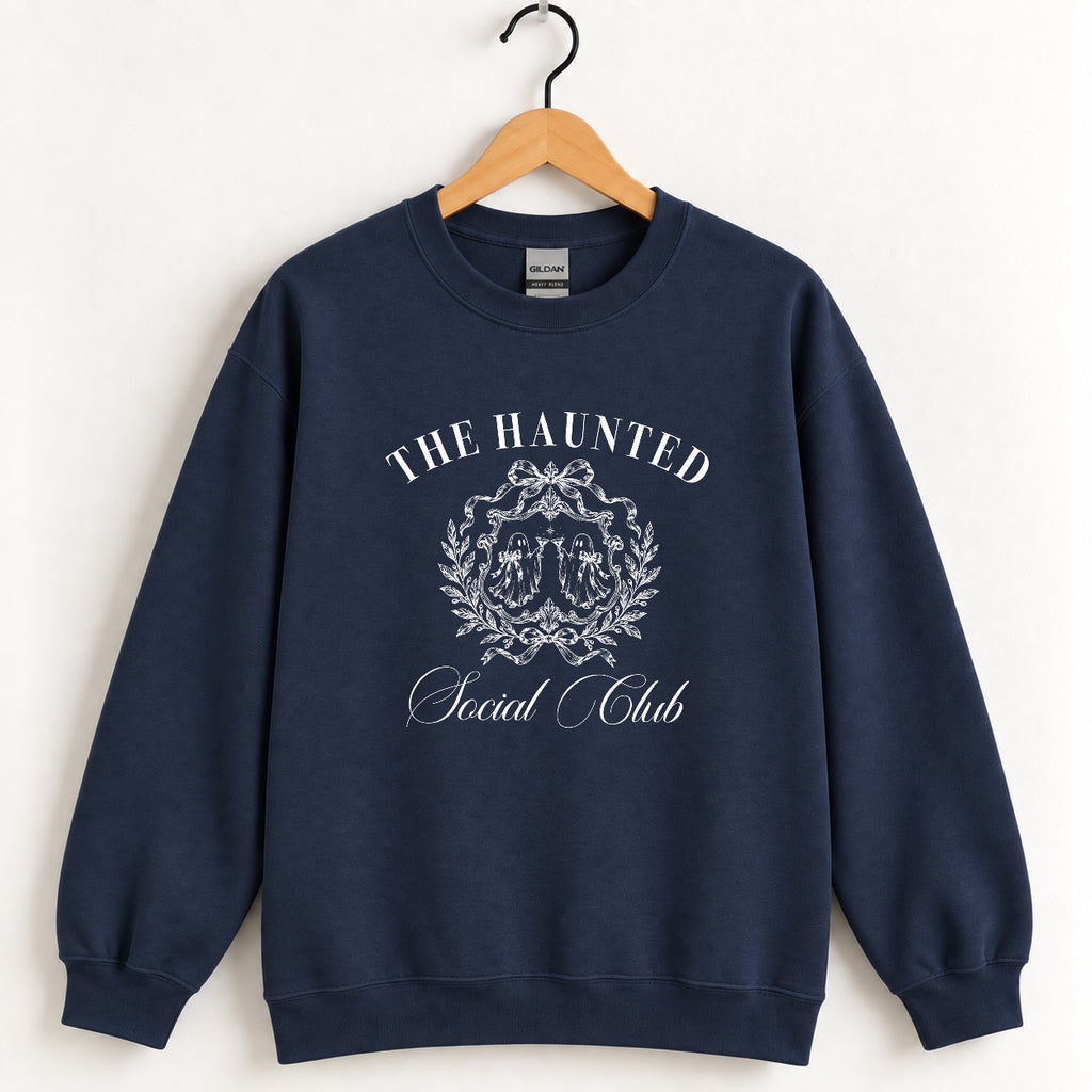 The Haunted Social Club crewneck sweatshirt in Navy on a wooden hanger
