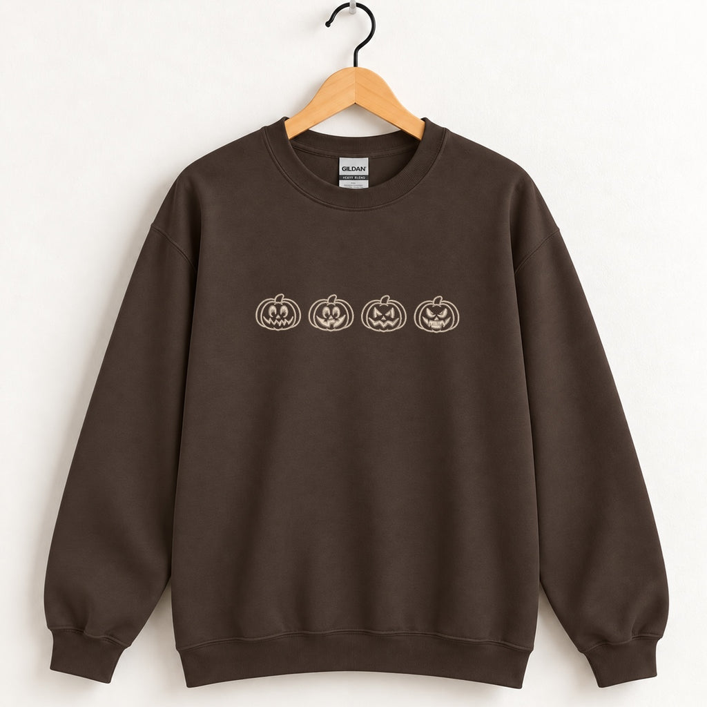 Jack-o-lantern embroidered crewneck sweatshirt in Dark Chocolate on a wooden hanger