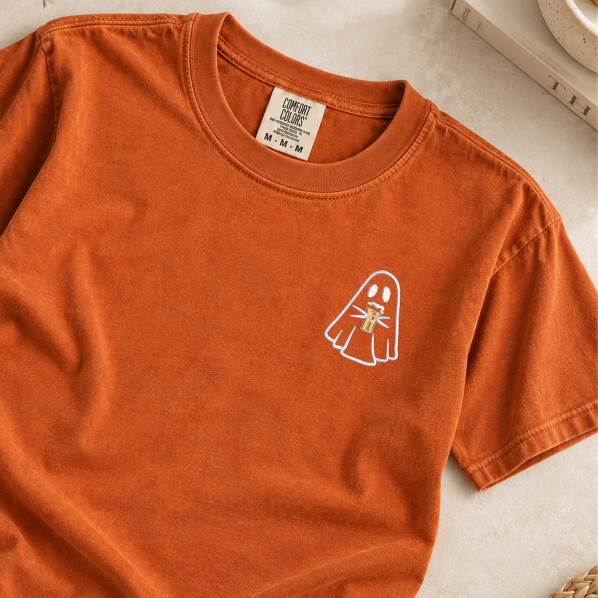 Ghost with a drink embroidered tee in Yam, flat lay, white ghost holding a beer on the left chest