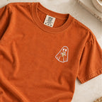 Ghost with a drink embroidered tee in Yam, flat lay, white ghost holding a beer on the left chest