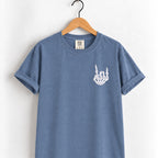 Rock on skeleton hand embroidered tee in Blue Jean on a wooden hanger