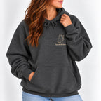 Woman wearing the Here for the Boos hoodie in Dark Heather with jeans