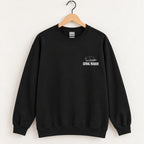 Serial Reader crewneck sweatshirt in Black on a wooden hanger
