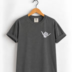 Shaka skeleton hand embroidered tee in Pepper on a wooden hanger