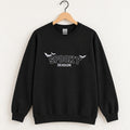 Spooky Season embroidered crewneck sweatshirt in Black on a wooden hanger, white thread lettering and bats