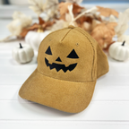 Jack-o-lantern embroidered corduroy snapback hat in Khaki with a black thread pumpkin face