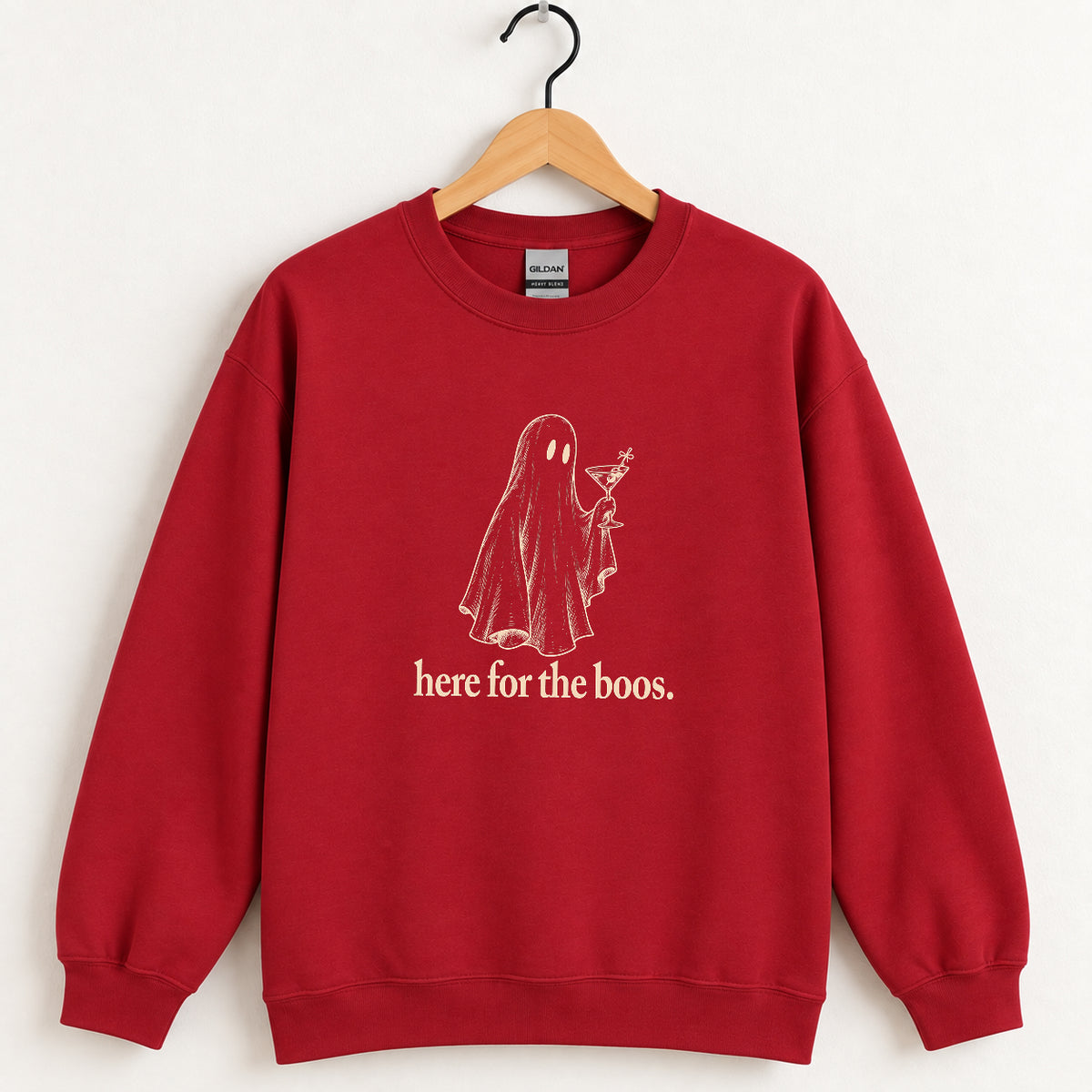 Here for the Boos crewneck sweatshirt in Cardinal Red on a wooden hanger