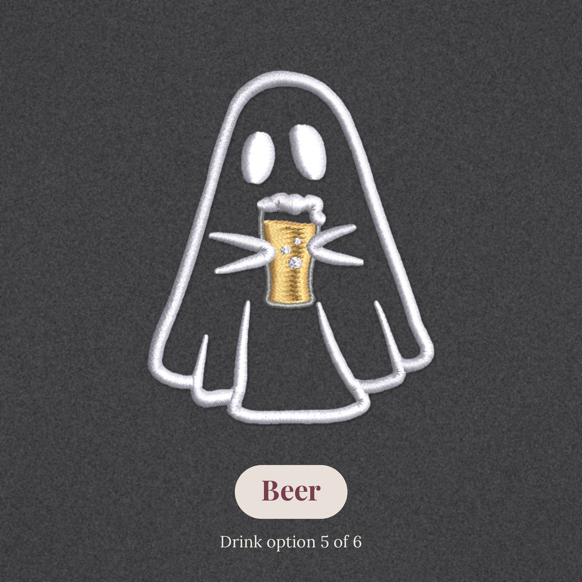 Close-up of the embroidered ghost holding a beer, drink option 5 of 6