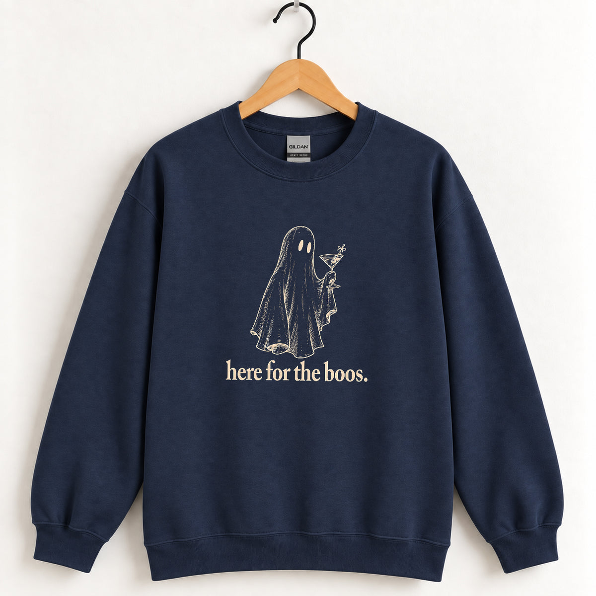 Here for the Boos crewneck sweatshirt in Navy on a wooden hanger