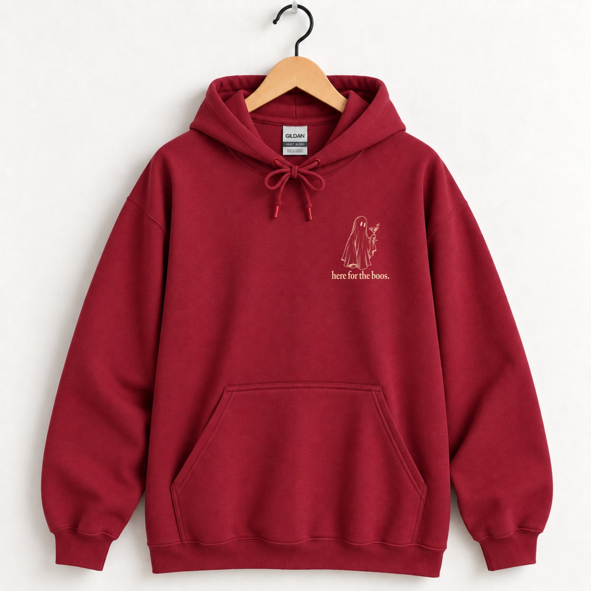 Here for the Boos hoodie in Cardinal Red on a wooden hanger