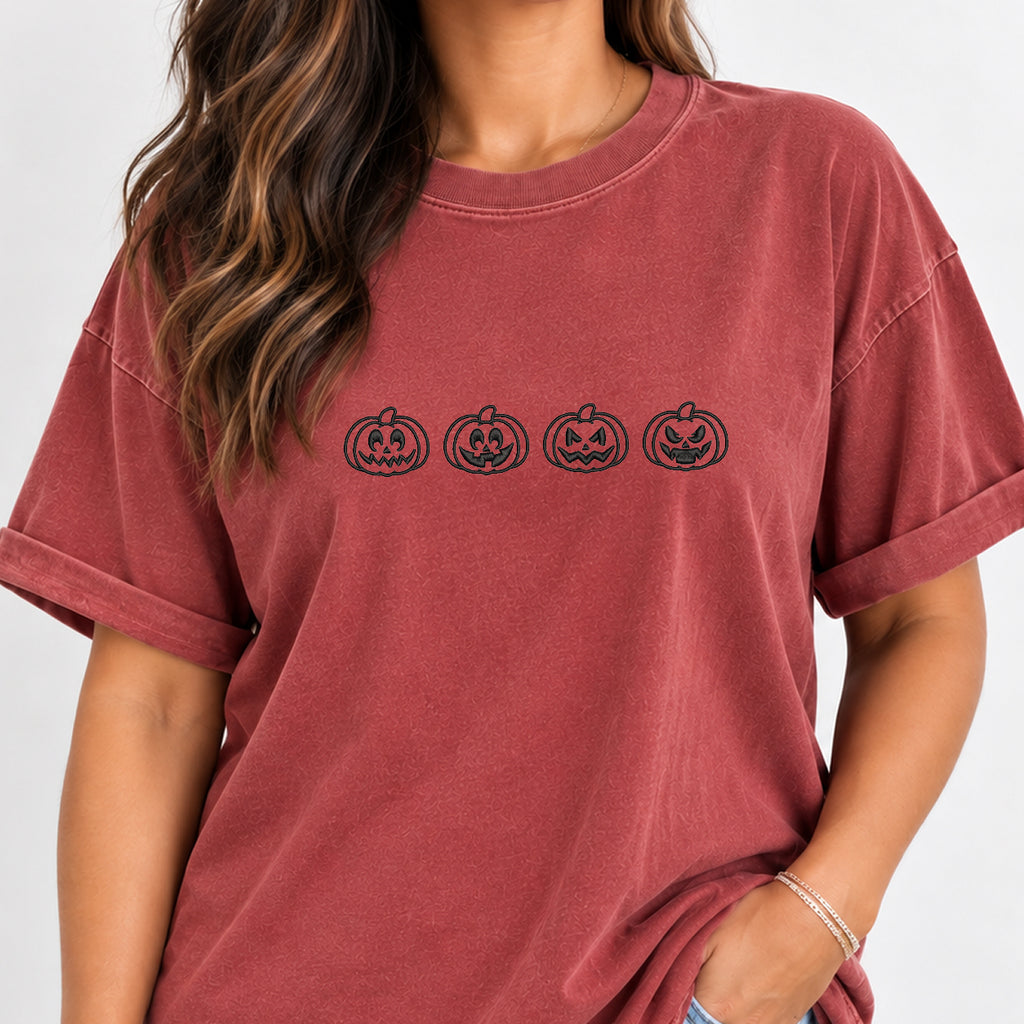 Woman wearing the jack-o-lantern embroidered tee in Chili