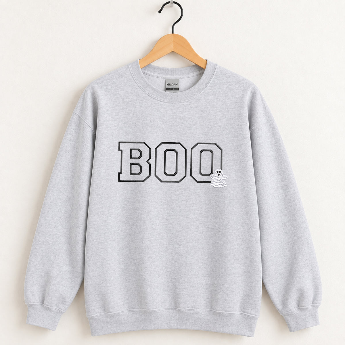 Boo embroidered crewneck sweatshirt in Ash on a wooden hanger