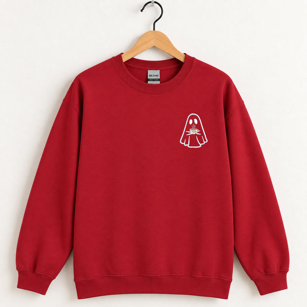 Ghost with a drink embroidered crewneck sweatshirt in Cardinal Red on a wooden hanger
