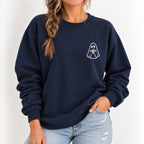 Woman wearing the ghost with a drink embroidered crewneck sweatshirt in Navy with jeans