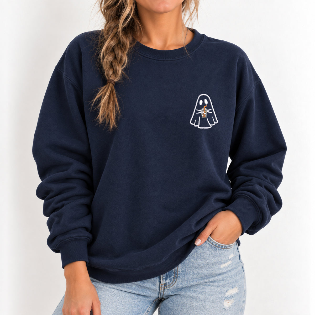 Woman wearing the ghost with a drink embroidered crewneck sweatshirt in Navy with jeans