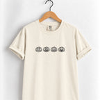 Jack-o-lantern embroidered tee in Ivory on a wooden hanger